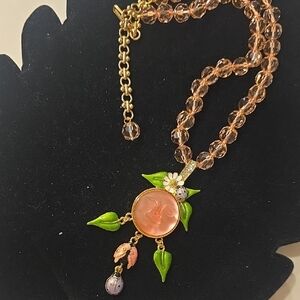 SUN MOON FACE ENAMEL LADY BUG ON PINK CRYSTAL CHAIN